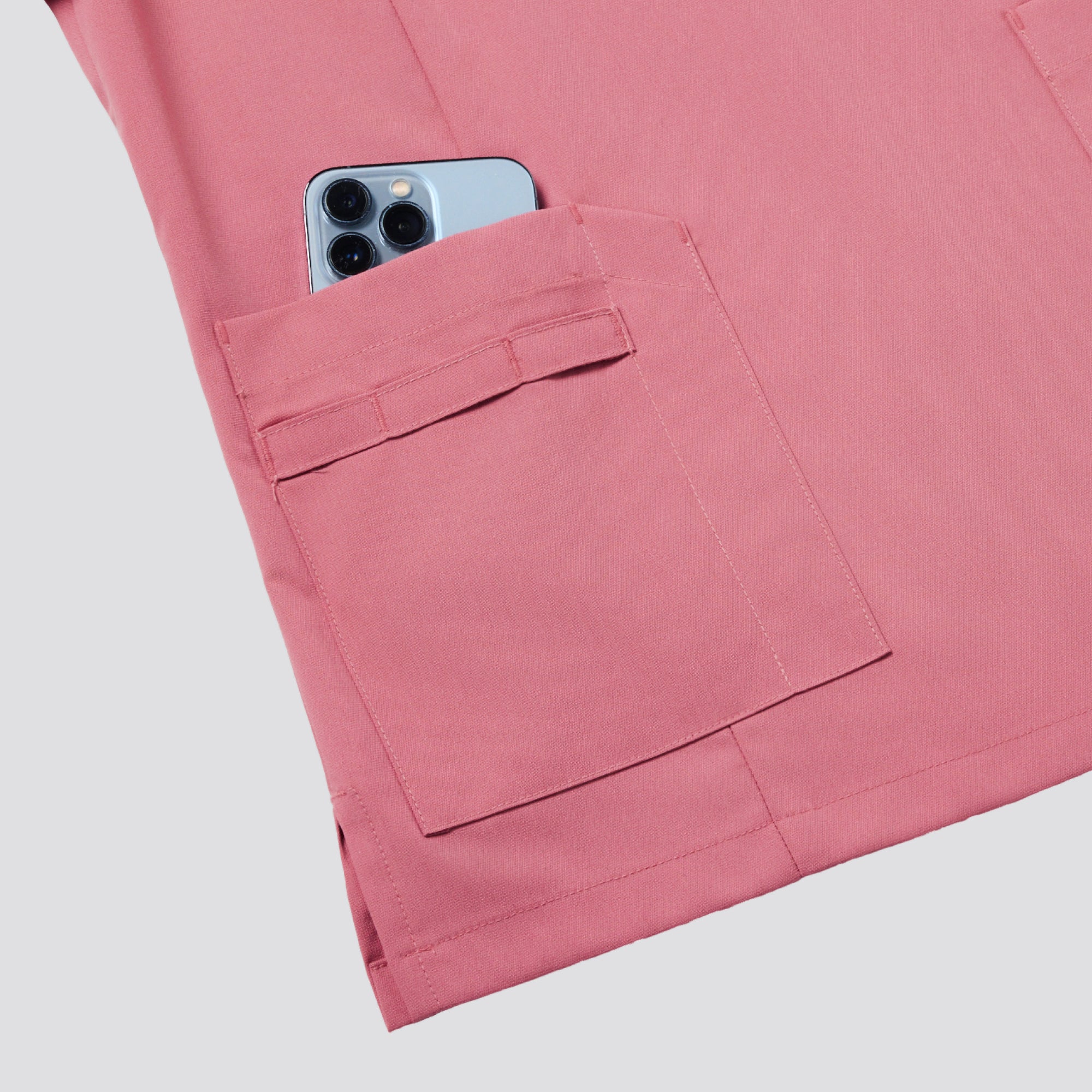 Image of Zenir | Women's VersaPocket Scrub Top - Coral Pink
