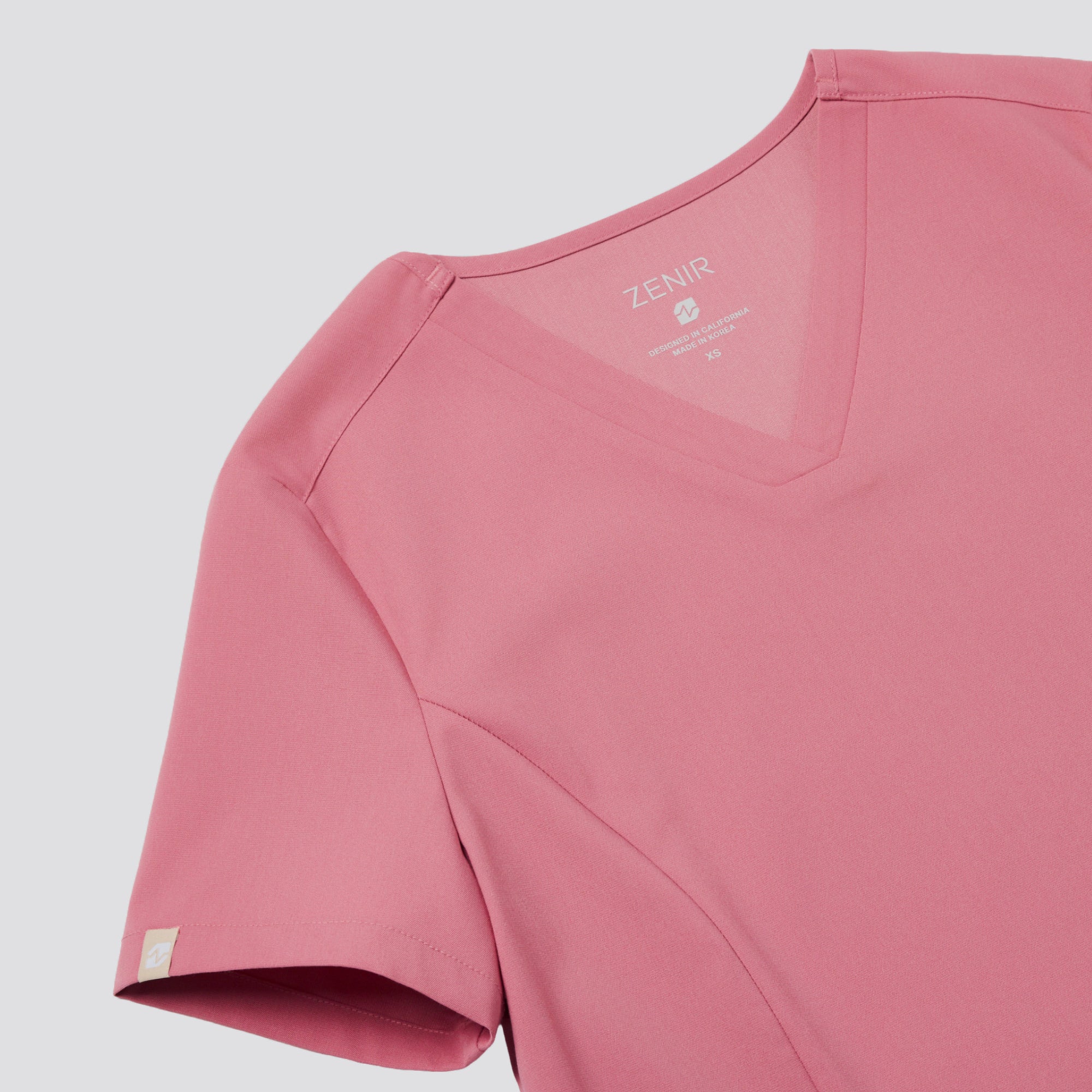 Image of Zenir | Women's VersaPocket Scrub Top - Coral Pink