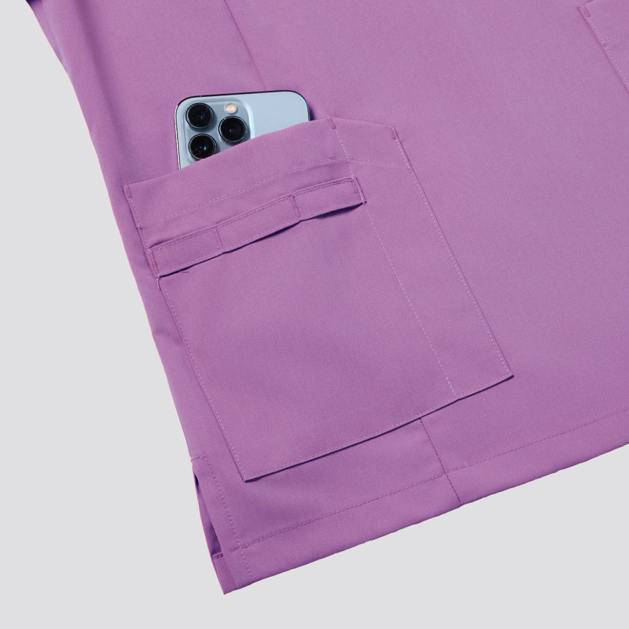 Image of Zenir | Women's VersaPocket Scrub Top - Mauve Pink