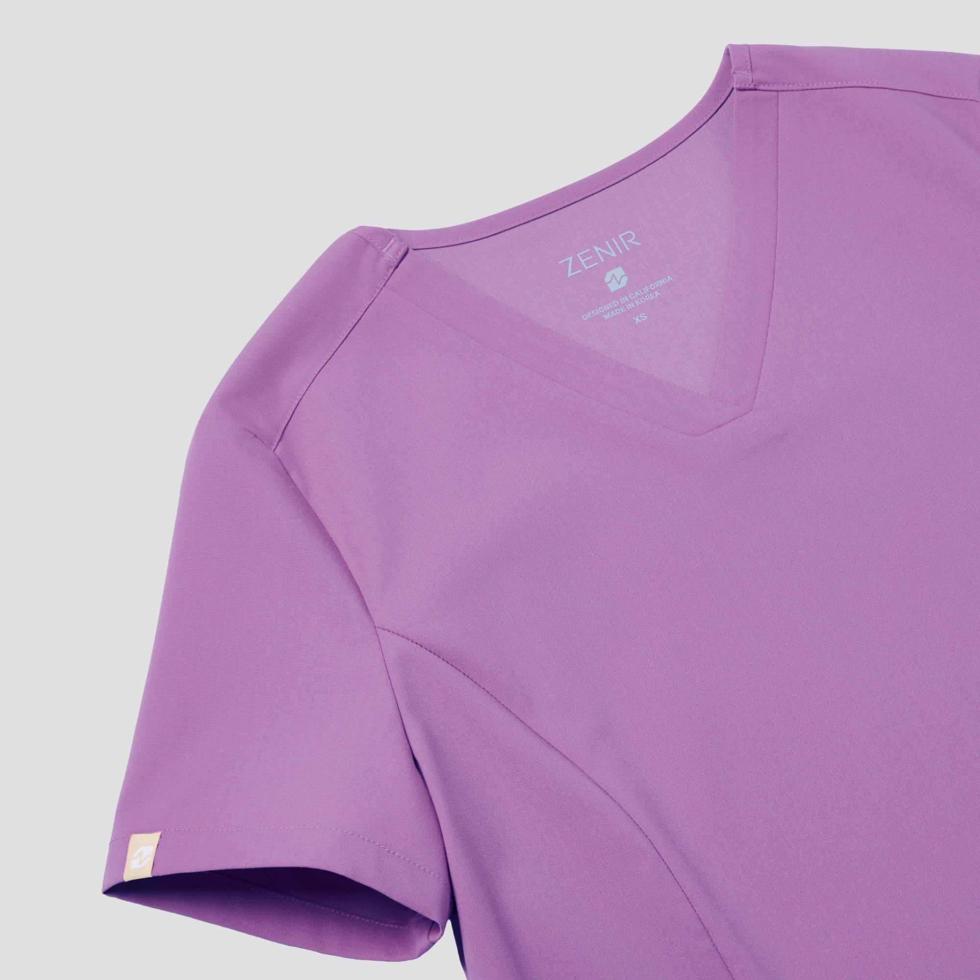 Image of Zenir | Women's VersaPocket Scrub Top - Mauve Pink