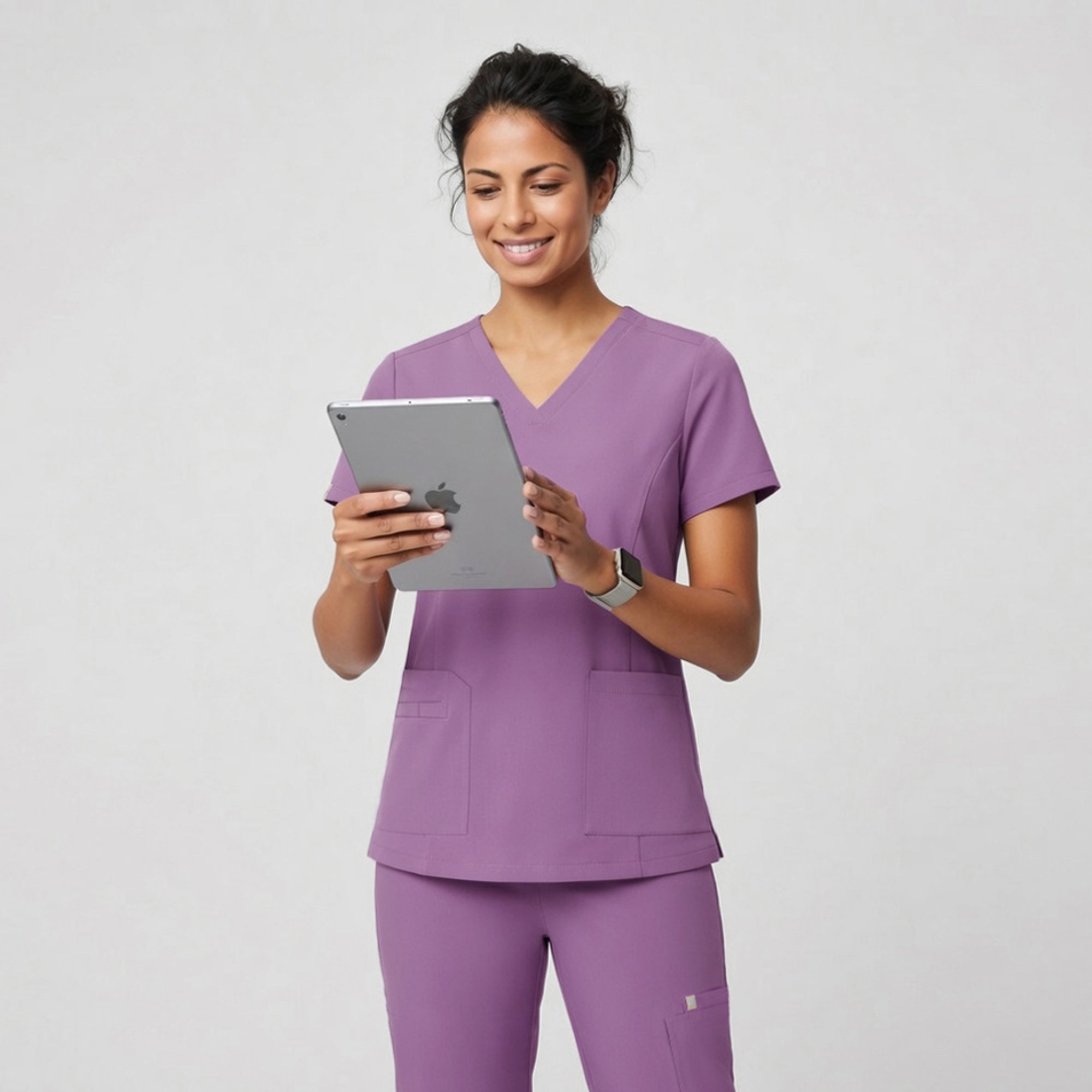 Image of Zenir | Women's VersaPocket Scrub Top - Mauve Pink