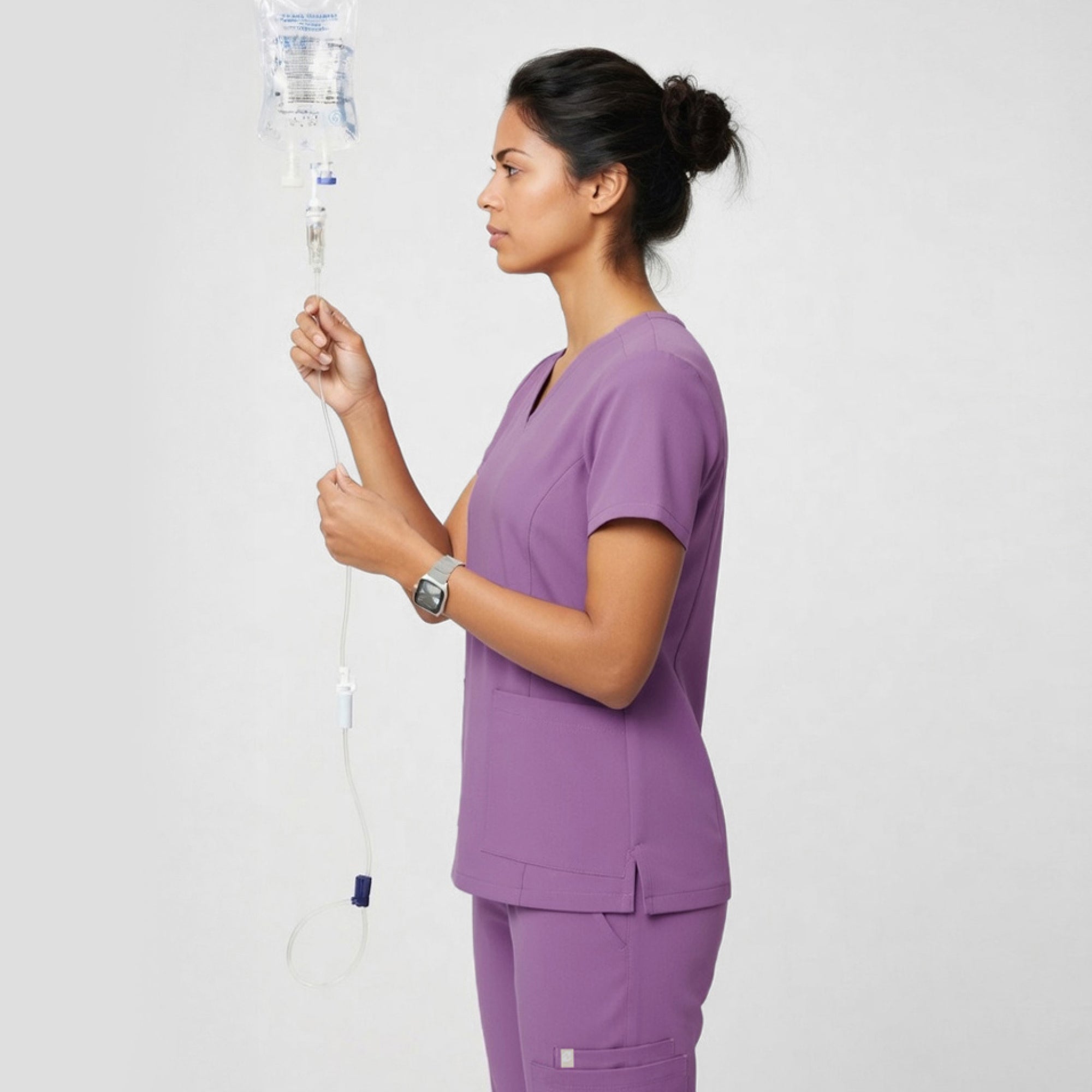 Image of Zenir | Women's VersaPocket Scrub Top - Mauve Pink