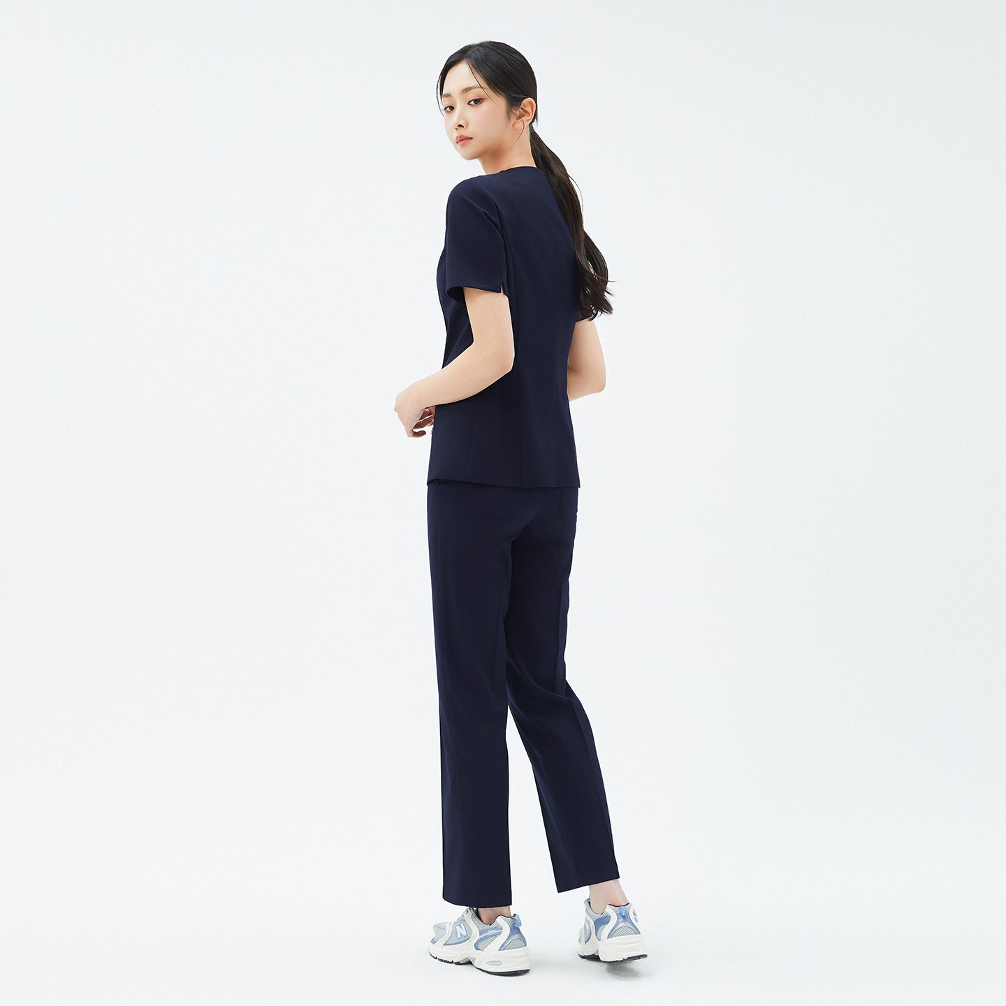 Image of TUL | OS-210 Women's Slim Fit Front Zipper Scrub Top - Navy