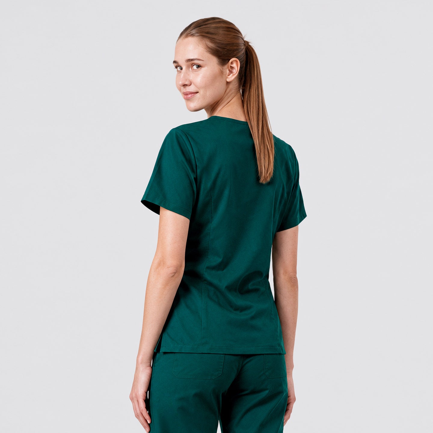 Image of Zenir | Women's 3-Pocket Scrub Top - Pine Green