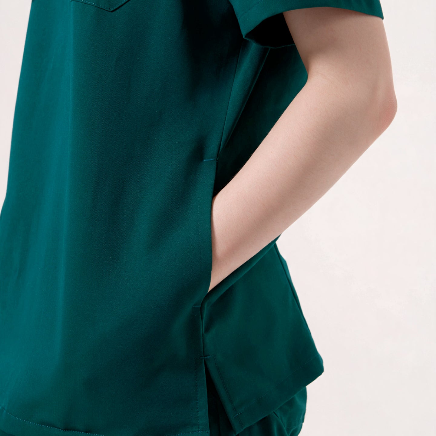 Image of Zenir | Women's 3-Pocket Scrub Top - Pine Green