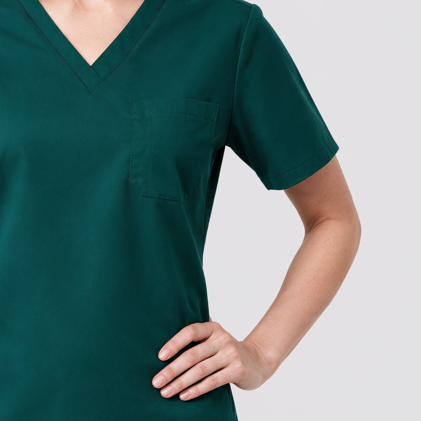 Image of Zenir | Women's 3-Pocket Scrub Top - Pine Green