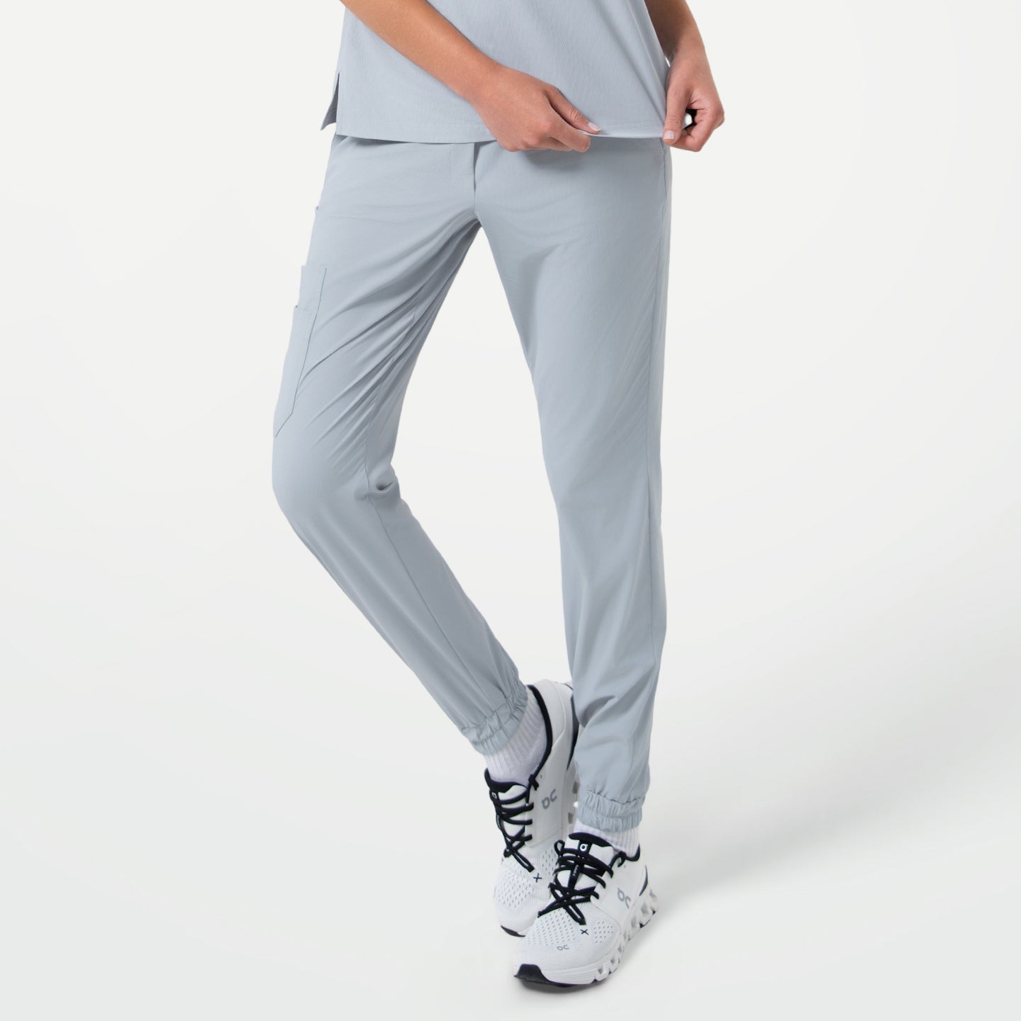Image of StretchFit jogger scrub pants in Cool Gray, shown from the front-side angle