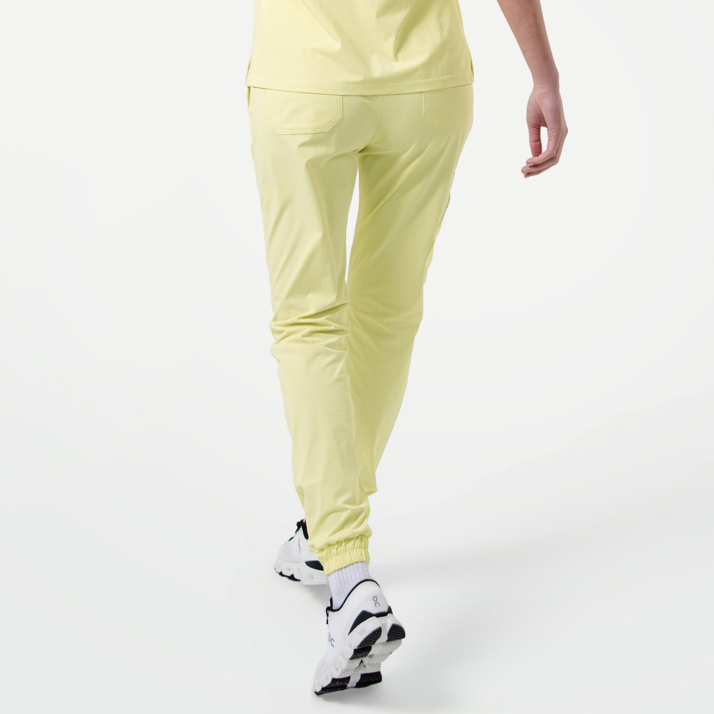 Image of Pineapple Yellow StretchFit jogger scrub pants in a back view