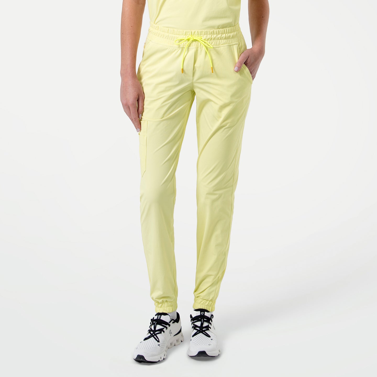 Image of Pineapple Yellow StretchFit jogger scrub pants in a front view,