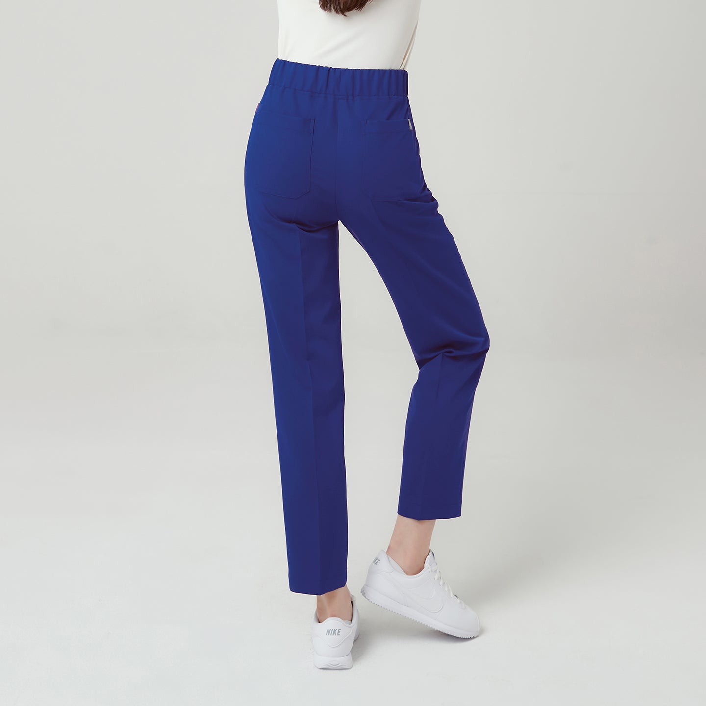 The Admiral Blue Pants provide a flattering, straight-leg silhouette that elongates the legs while ensuring unrestricted comfort.