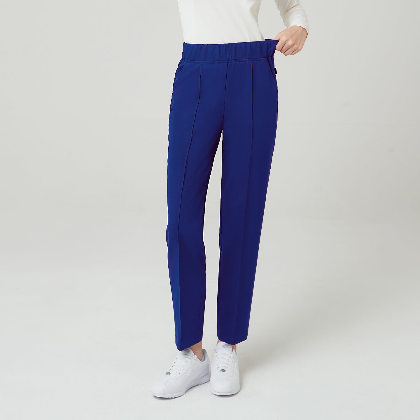 The Admiral Blue Pants feature a streamlined front crease that adds structure and lengthens the silhouette.
