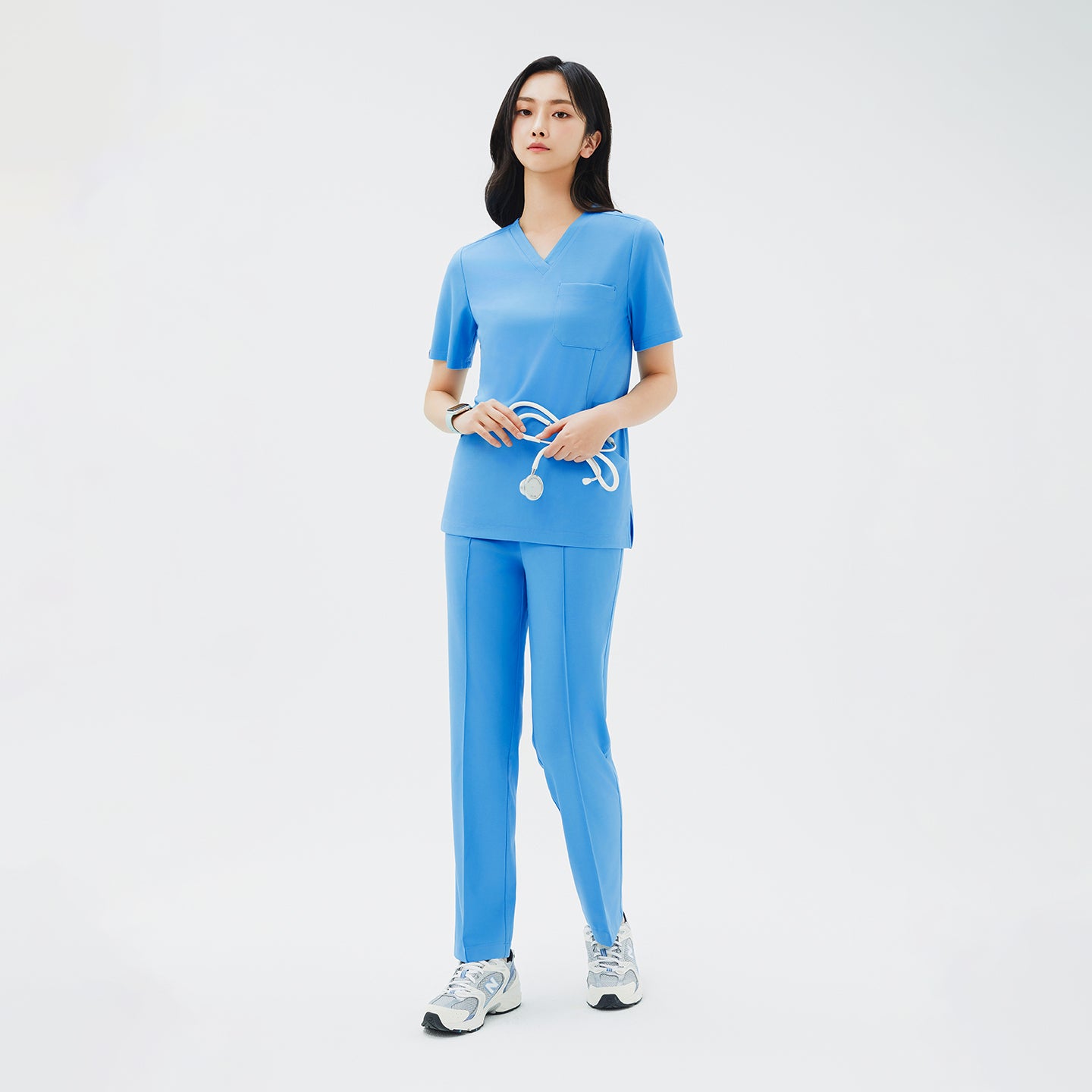 Image of Styled with a matching top, the Aqua Blue Premium Banding Scrub Pants create a cohesive, professional ensemble.