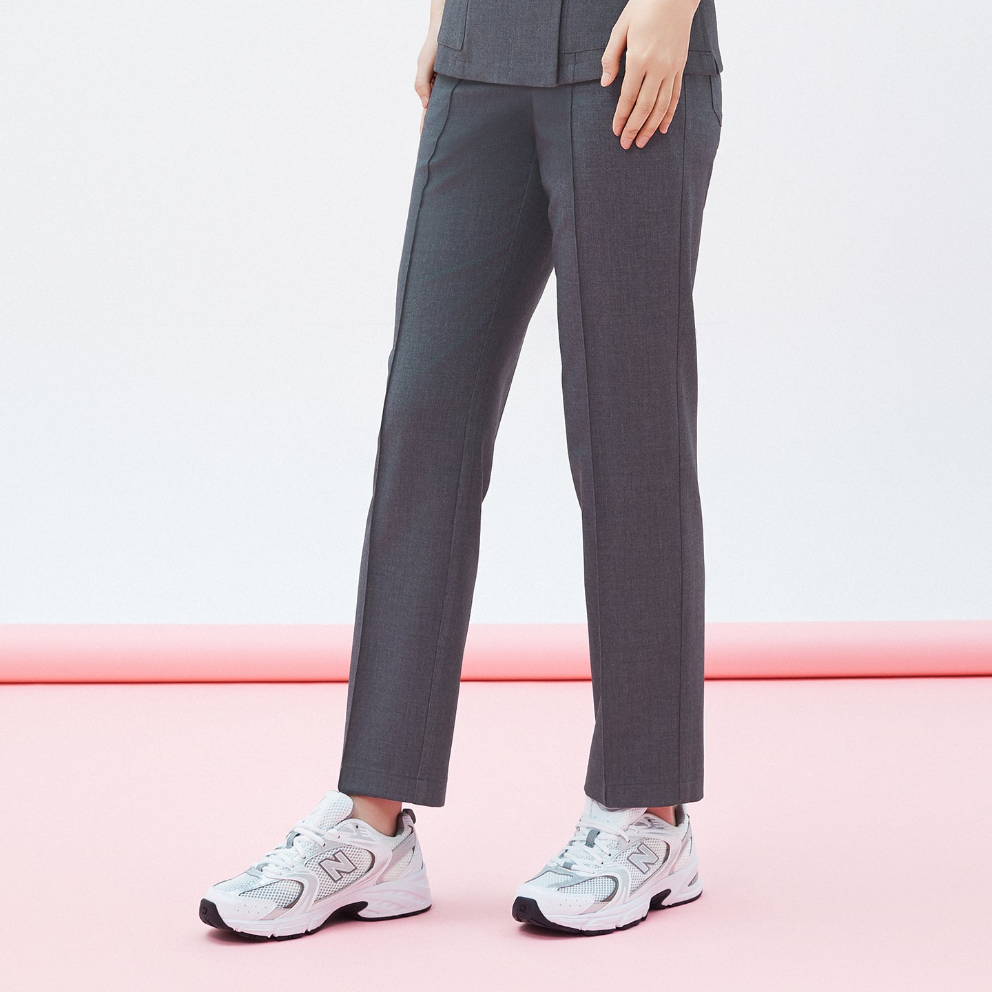 Image of Showcasing a polished front crease and clean lines, the Charcoal Gray Premium Banding Scrub Pants offer a refined, structured look.