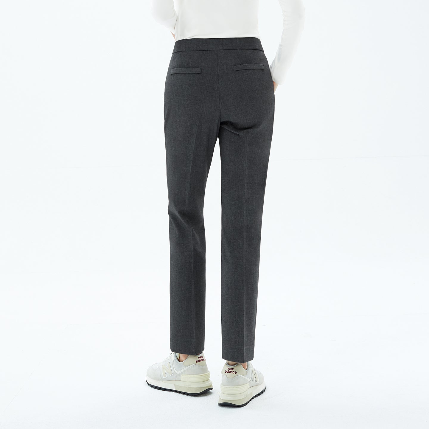 The Charcoal Gray Pants feature a streamlined back view with neatly finished welt pockets and a modern straight fit.