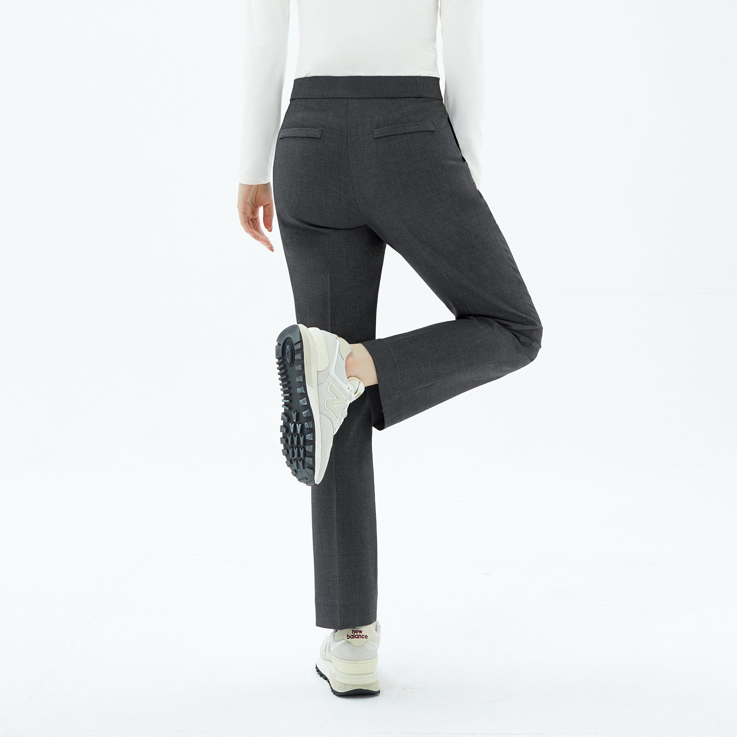 The Charcoal Gray Pants feature a clean, tailored back design with refined welt pockets.