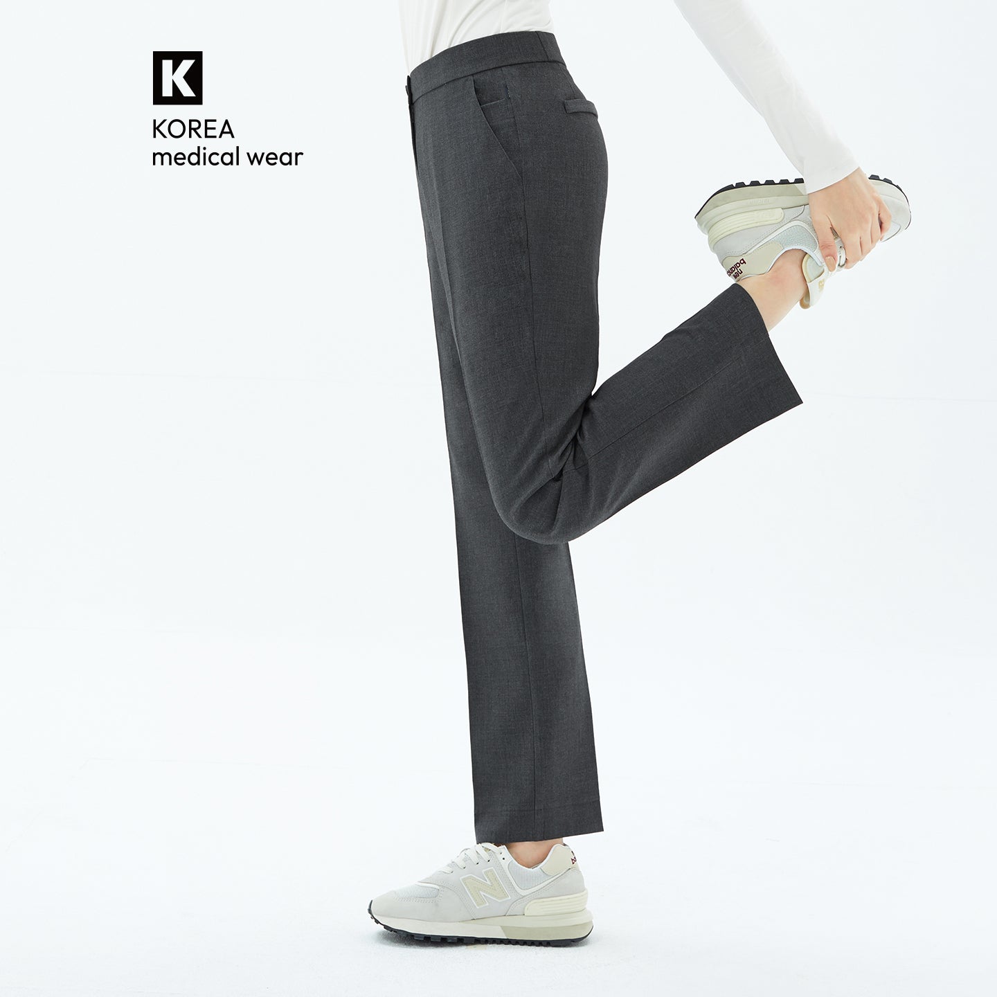 The Charcoal Gray Pants offer a sleek, tailored fit with a side-hidden banding detail that ensures all-day comfort.