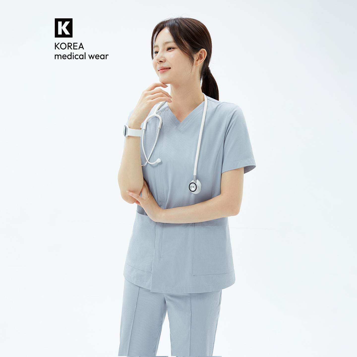 The OS-224 in cool gray offers a calm, professional look with a modern V-neck design and soft, breathable fabric for lasting comfort throughout the day.