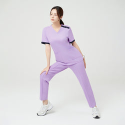 Image of TUL | OS-230 Women's Active Stretch Scrub Top - Lavender
