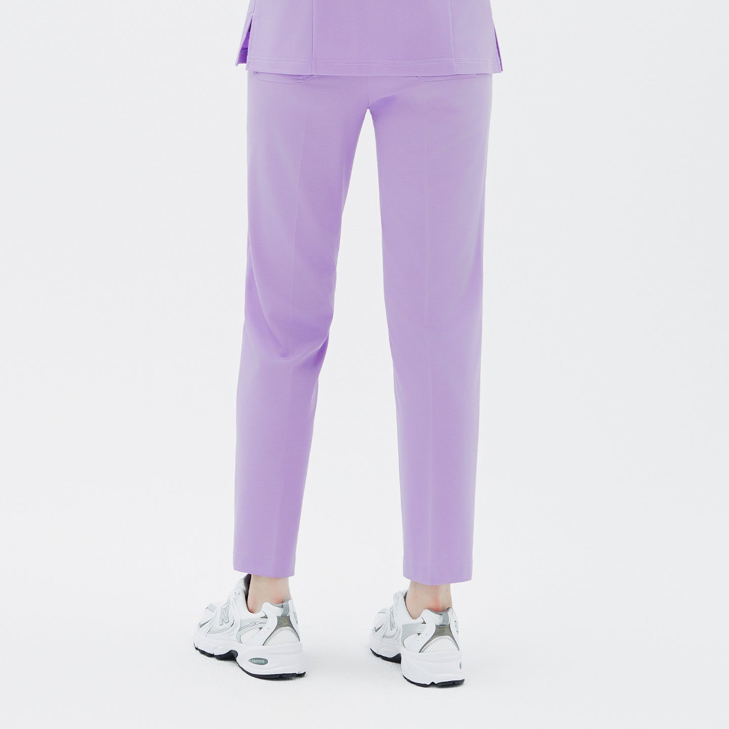 A sleek, minimal design that emphasizes clean lines and a flattering silhouette.
The straight-leg cut falls naturally, ensuring ease of movement while maintaining a polished, professional look.