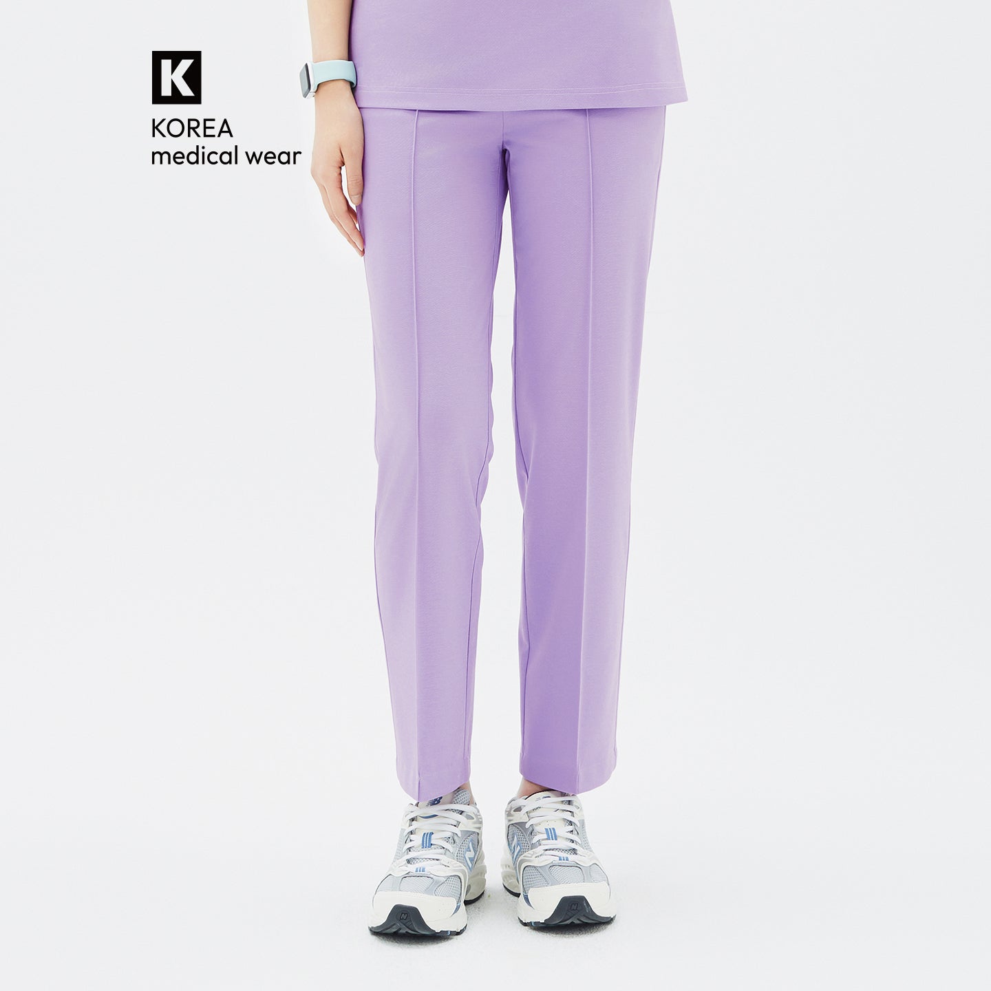 Lavender Premium Banding Pants feature a neat front crease that creates a slim, elongated leg line.
Crafted from a soft, stretchable fabric, they provide flexibility and comfort while maintaining a refined, elegant silhouette.