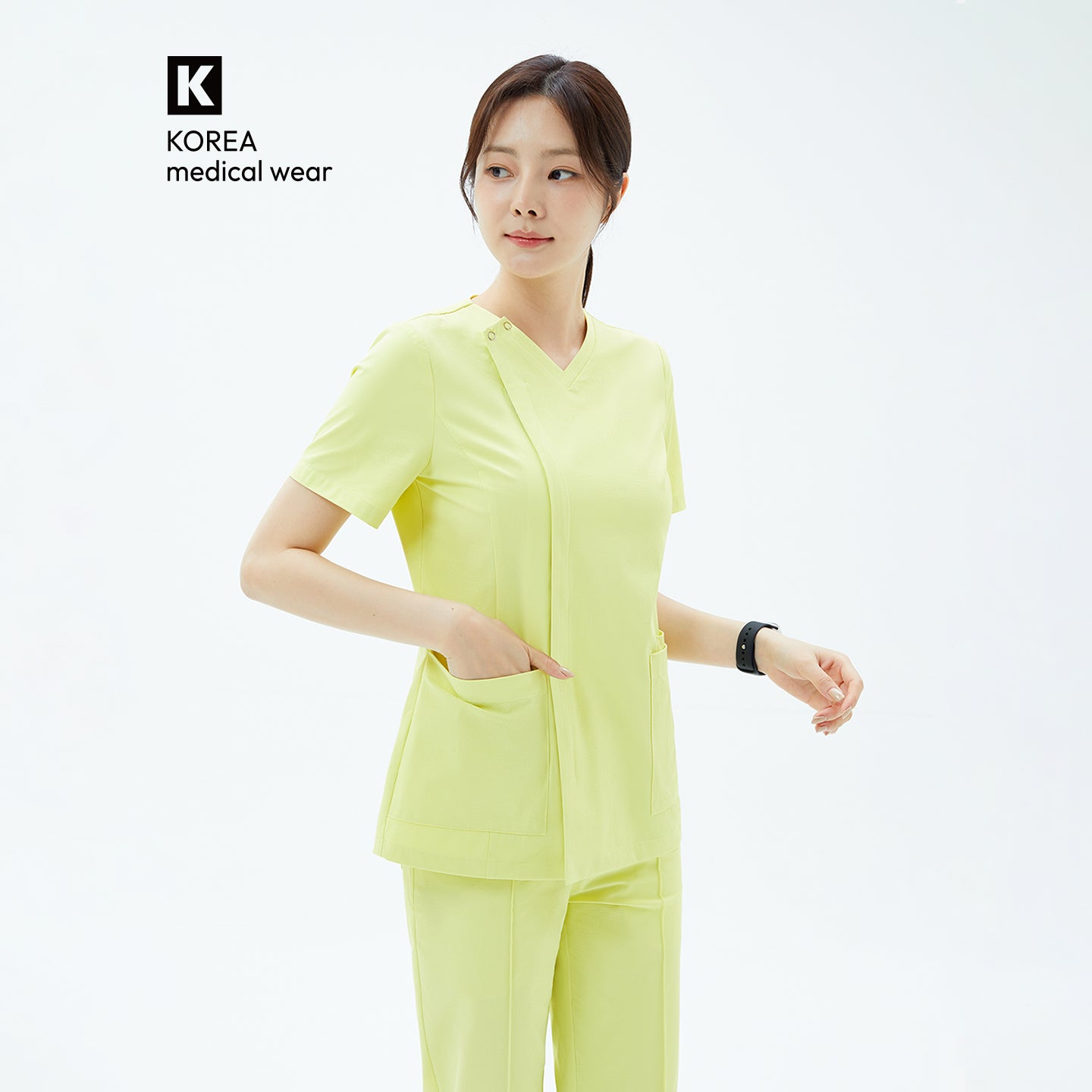 The OS-223 in pineapple yellow showcases a clean, structured silhouette with practical front pockets and a sleek asymmetric zip detail for a refined professional look.