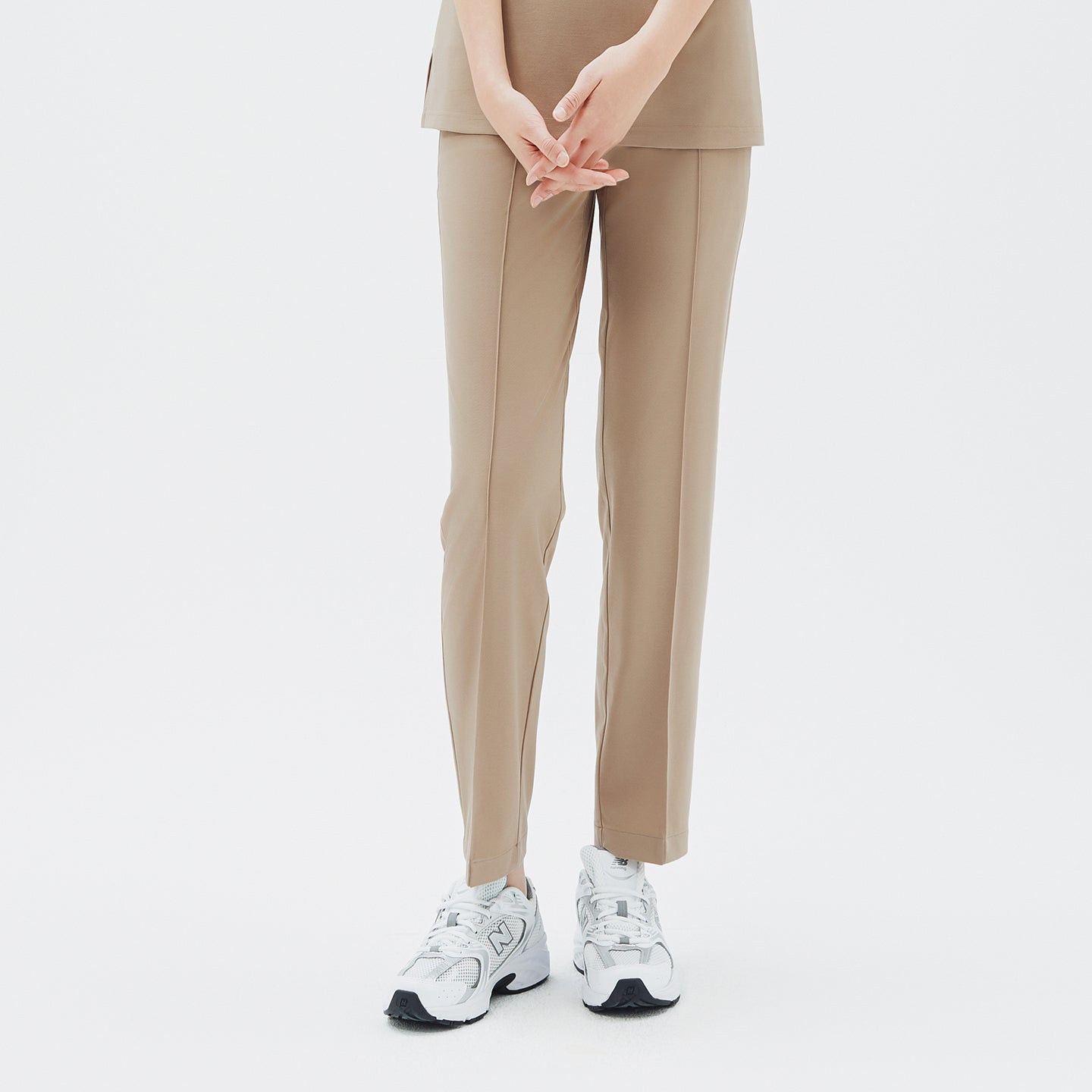 Image of Streamlined lines and a tailored fit highlight a sense of understated sophistication.
Crafted from smooth, flexible fabric, it offers both structure and freedom of movement for a modern, refined look.