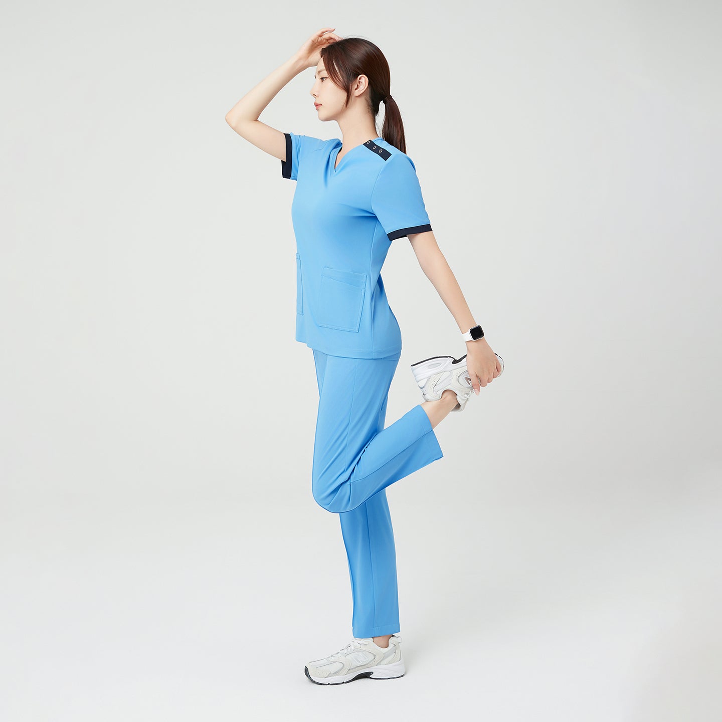 Image of The Sky Blue OS-231 scrub set delivers excellent stretch and recovery, allowing for free, athletic movement — ideal for dynamic, active work environments.