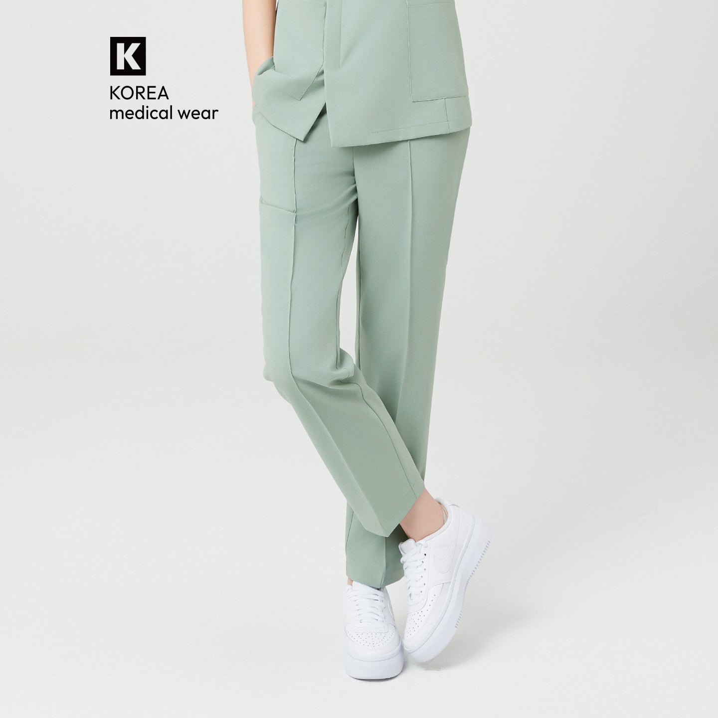 
Soft Mint Line Banding Pants offer a clean, straight silhouette with a relaxed yet tailored fit.