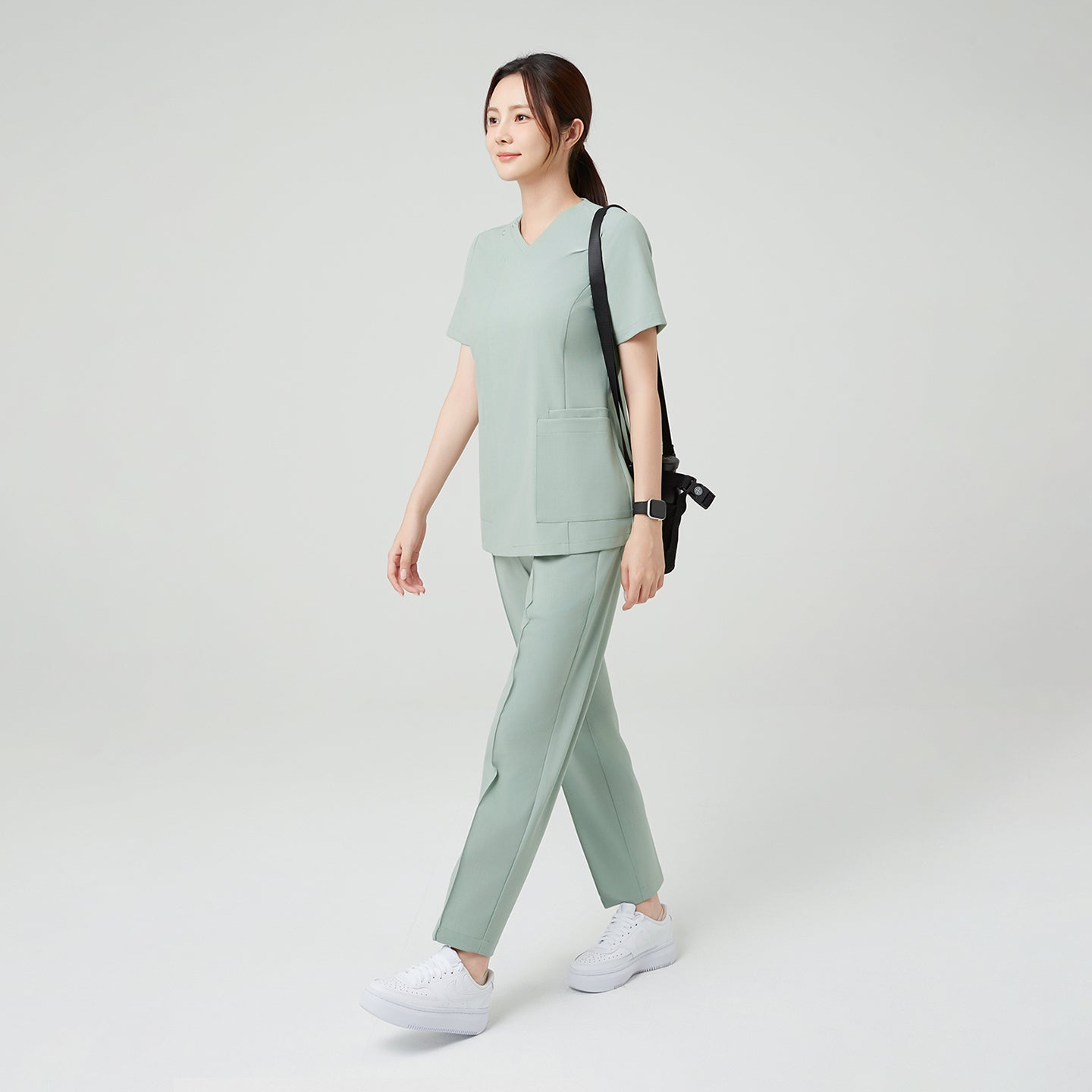 The Soft Mint set-up conveys a calm, effortless look with its balanced fit and clean lines.
Lightweight fabric allows for natural movement, while the muted tone enhances a refined, modern minimalism.