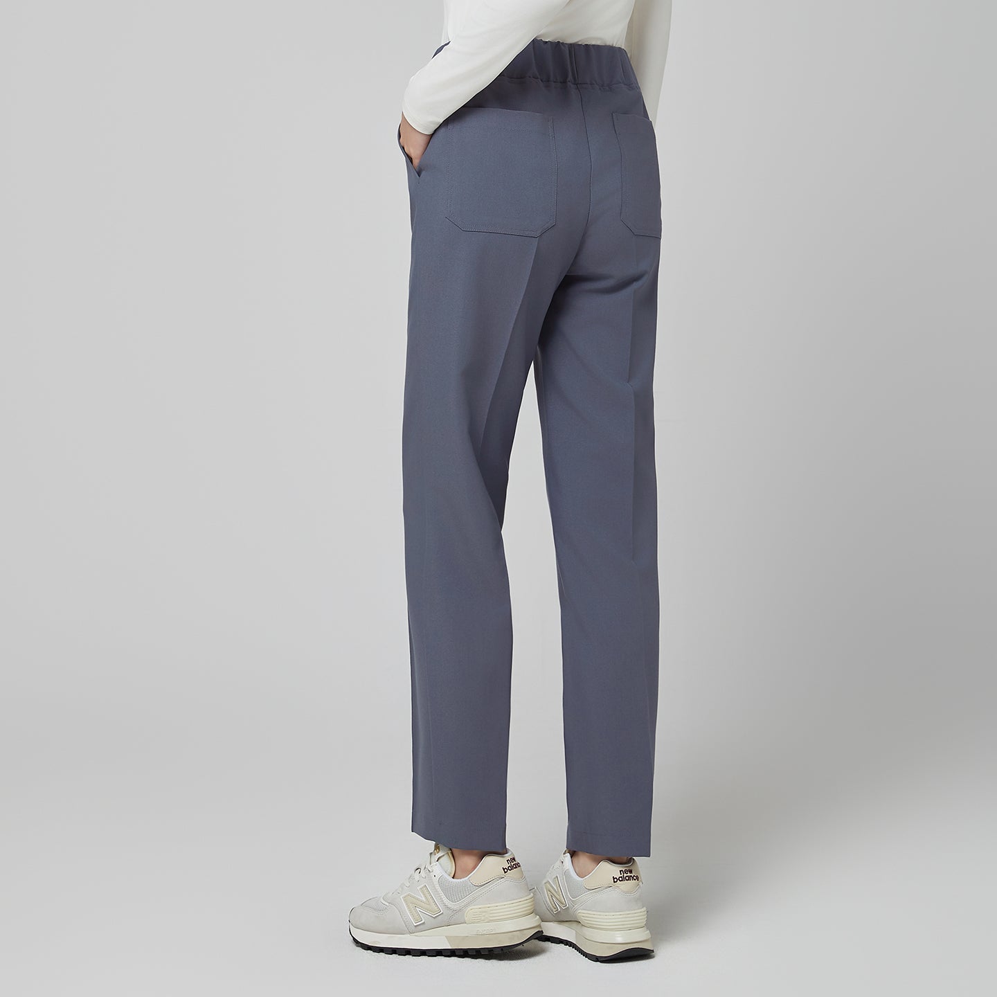 Blue Gray Women’s Premium Banding Pants designed with an elastic waistband and straight-leg cut, offering a sleek silhouette and comfortable everyday fit.
