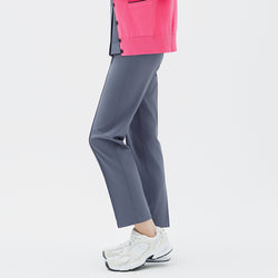 Image of Side angle of TUL Women's Premium Banding Pants in Blue Gray, showcasing the stretch fabric and discreet banding detail.