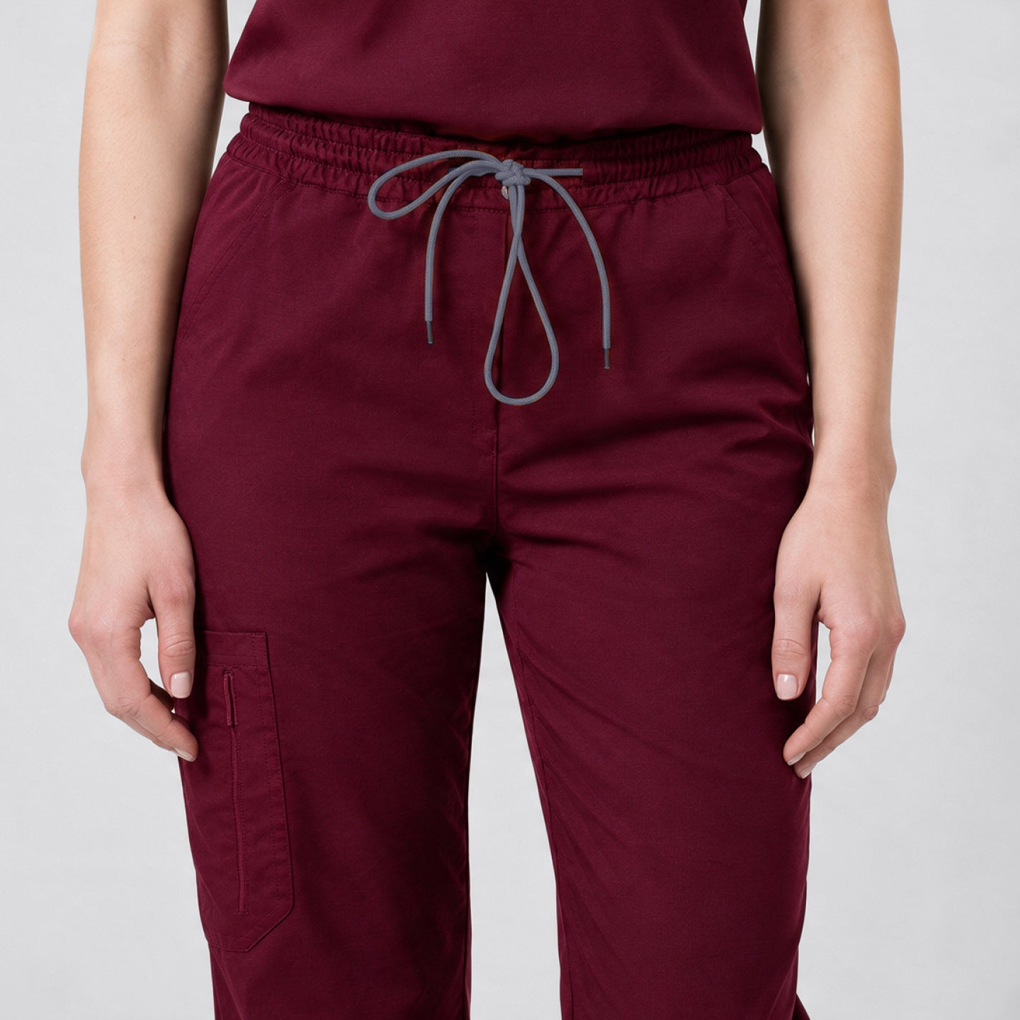 Image of Zenir | Women's Zipper Pocket Split Hem Scrub Pants - Burgundy