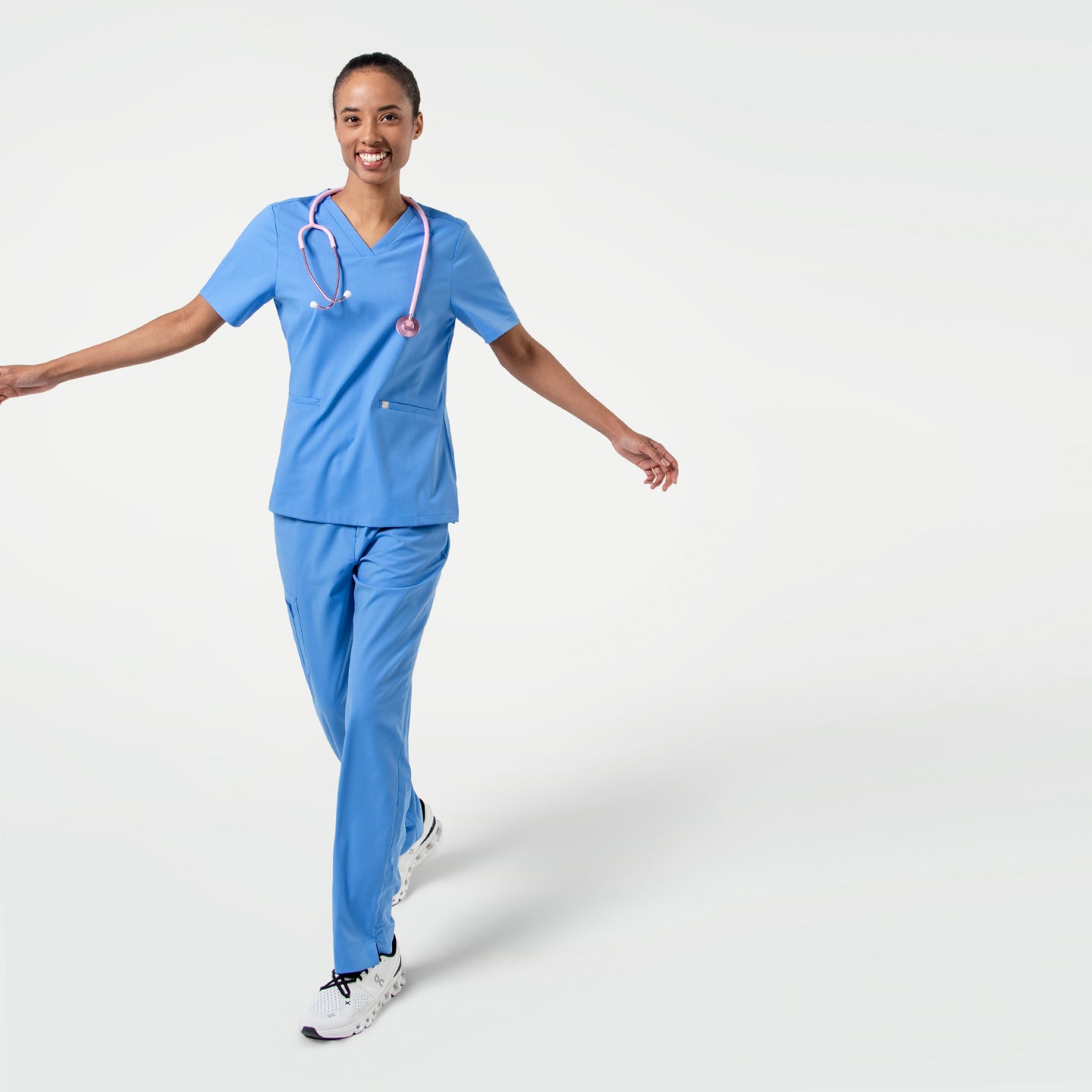 Smoky Blue Double Pocket Scrub Top presents a calm, professional tone with its muted blue shade and functional double-pocket design.