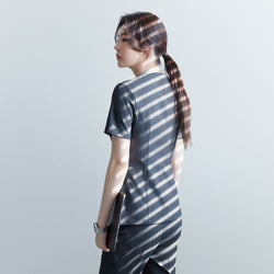 Image of Back view of TUL OS-182 Women's Charcoal Gray scrub top, showing streamlined seams and a tailored silhouette.