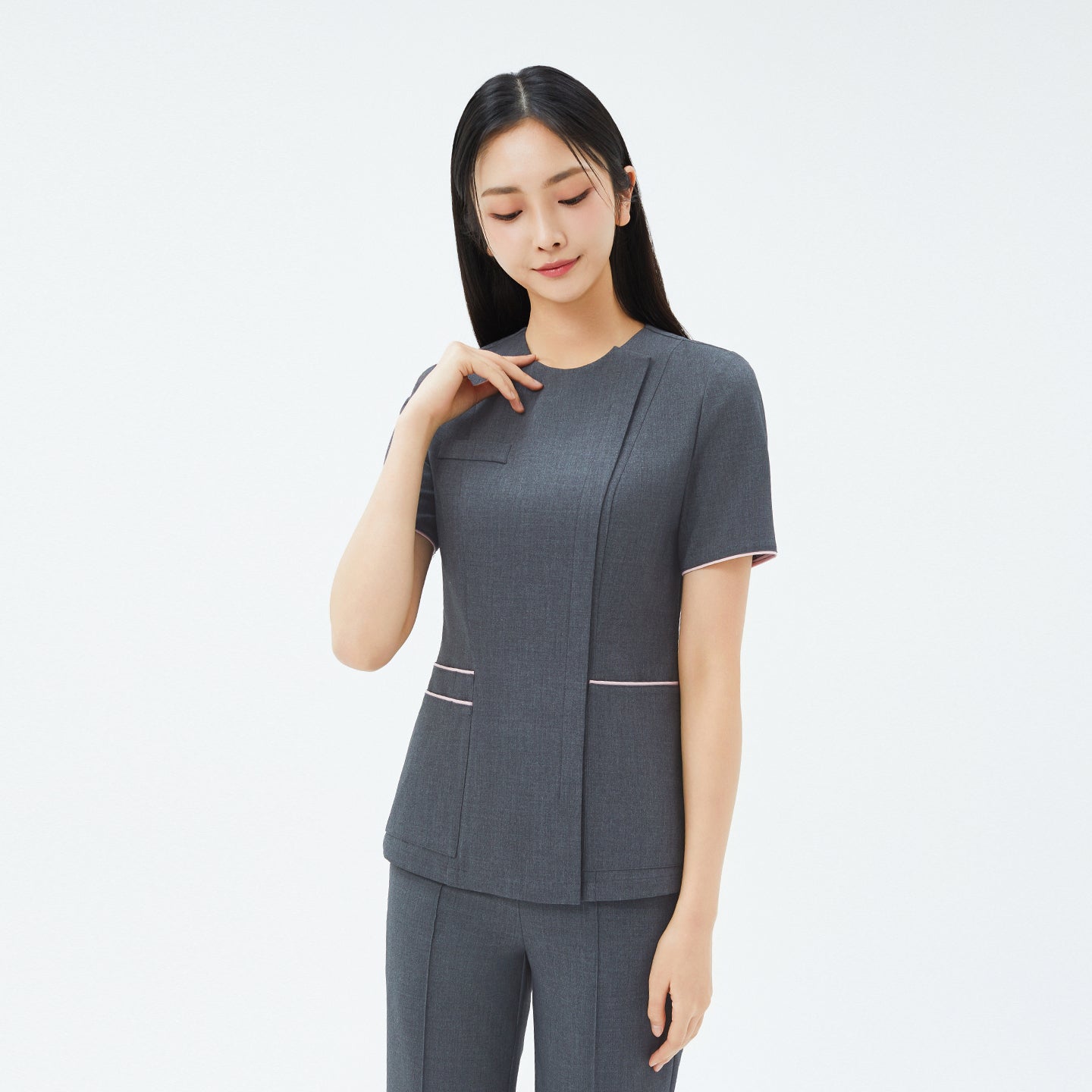 Front view of TUL OS-211 Women's Edge Stripe Scrub Top in Chacoal Gray, showcasing a sleek stripe detail and tailored fit.