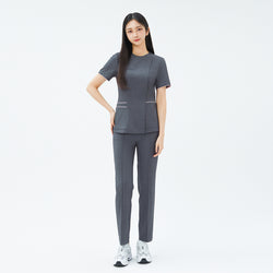 Image of Front view of TUL OS-211 Women's Edge Stripe Scrub Top in Chacoal Gray, paired with matching pants for a cohesive, professional ensemble.