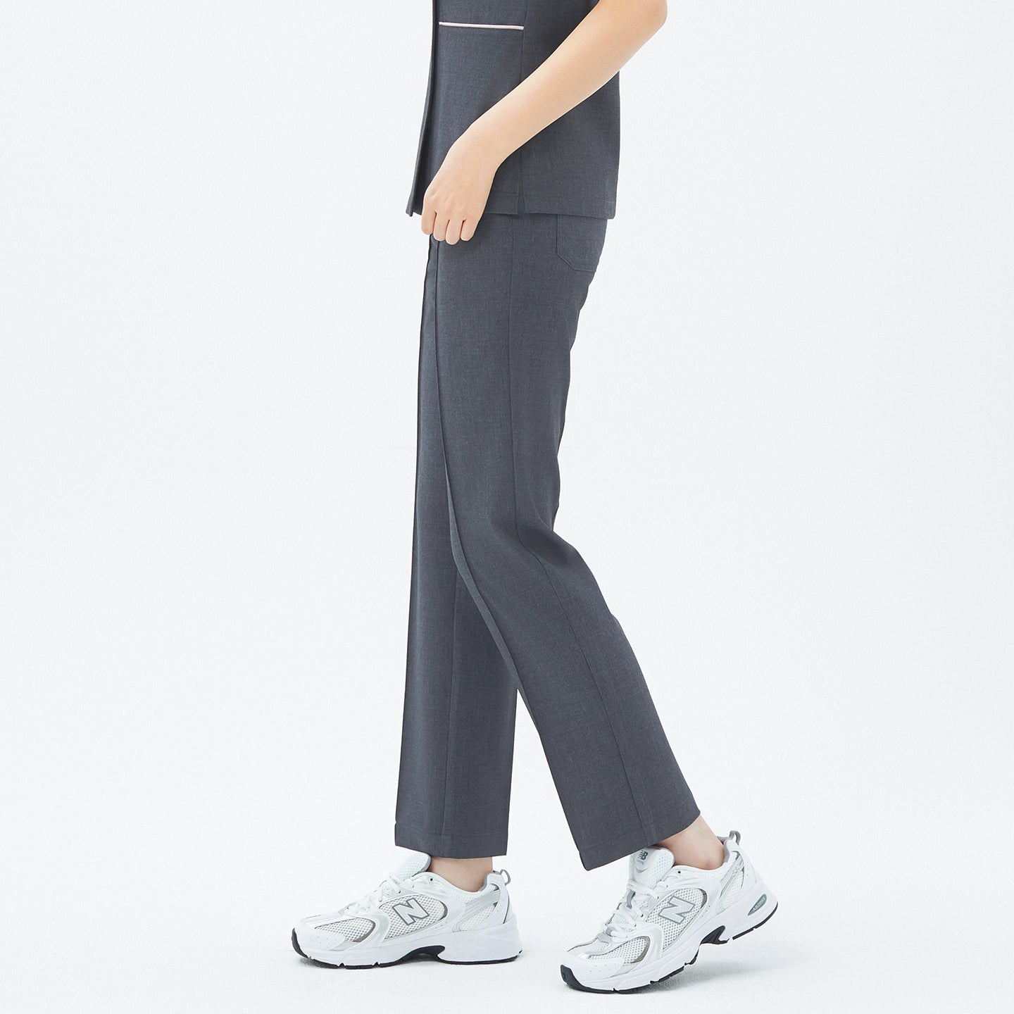 Side angle of TUL Women's Premium Banding Pants in Chacoal Gray, showing the sleek fit and comfortable stretch fabric.