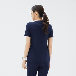 Image of Back view of TUL OS-213 Classic Navy scrub top, featuring a streamlined silhouette and comfortable fabric for all-day wear.