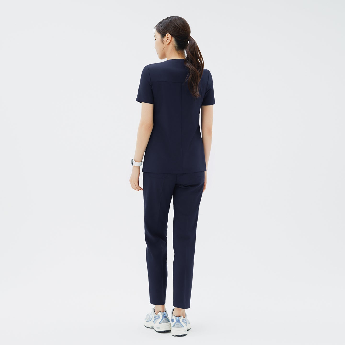 Back view of TUL Women's Premium Banding Pants in Classic Navy, emphasizing a tailored fit and high-quality fabric construction.