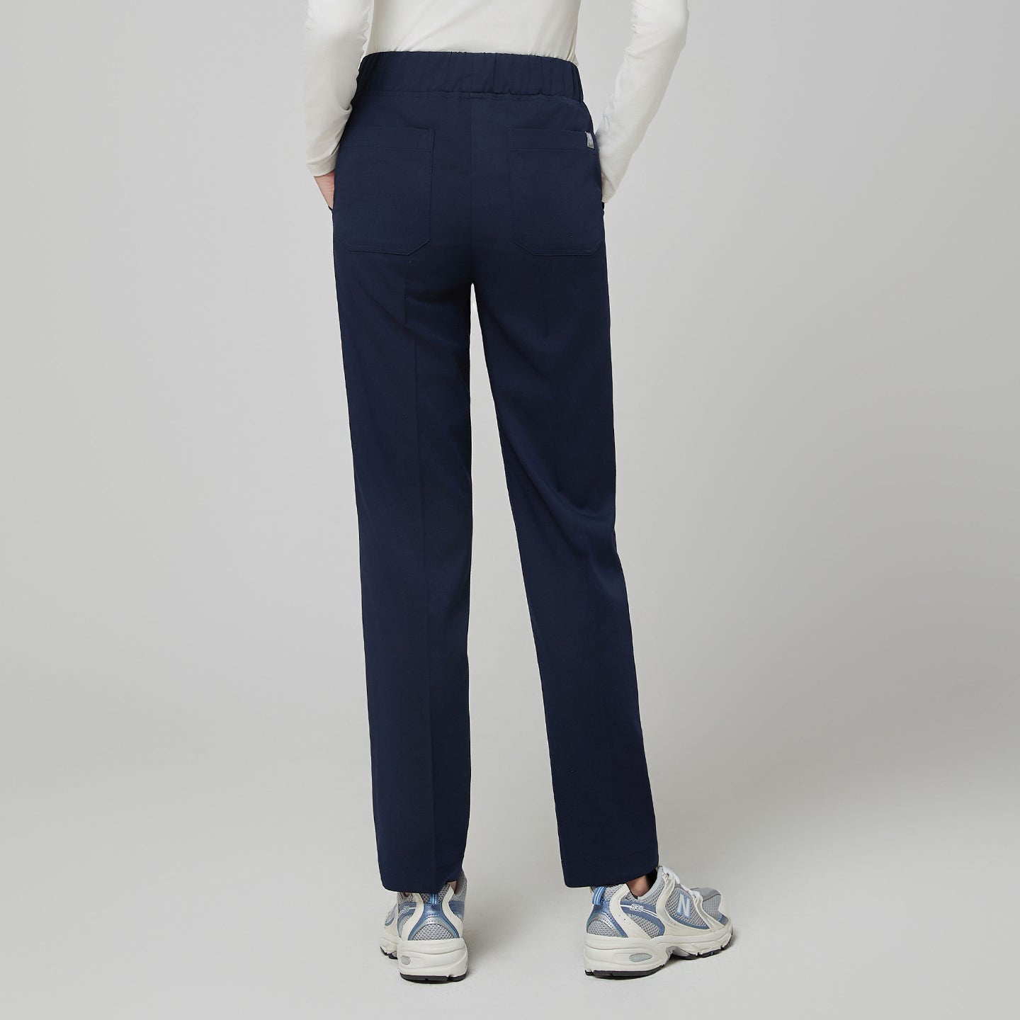 Image of Back view of TUL Women's Premium Banding Pants in Classic Navy, emphasizing a tailored fit and high-quality fabric construction.