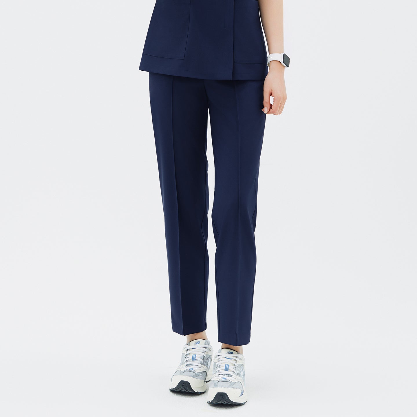 Front view of TUL Women's Premium Banding Pants in Classic Navy, highlighting a tapered leg and comfortable waistband.