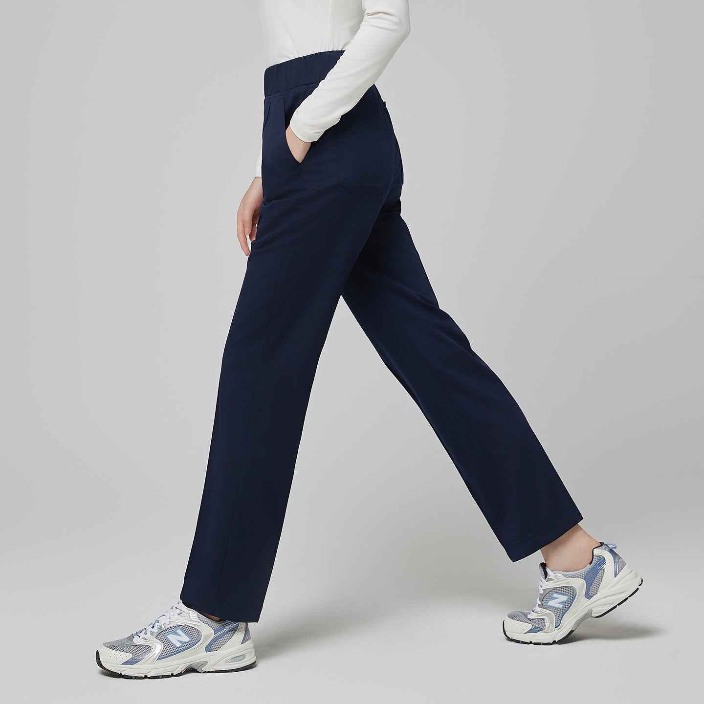 Image of Classic Navy Women’s Premium Banding Pants with a straight-leg silhouette and high-rise elastic waistband, offering flexibility and a polished professional fit.

