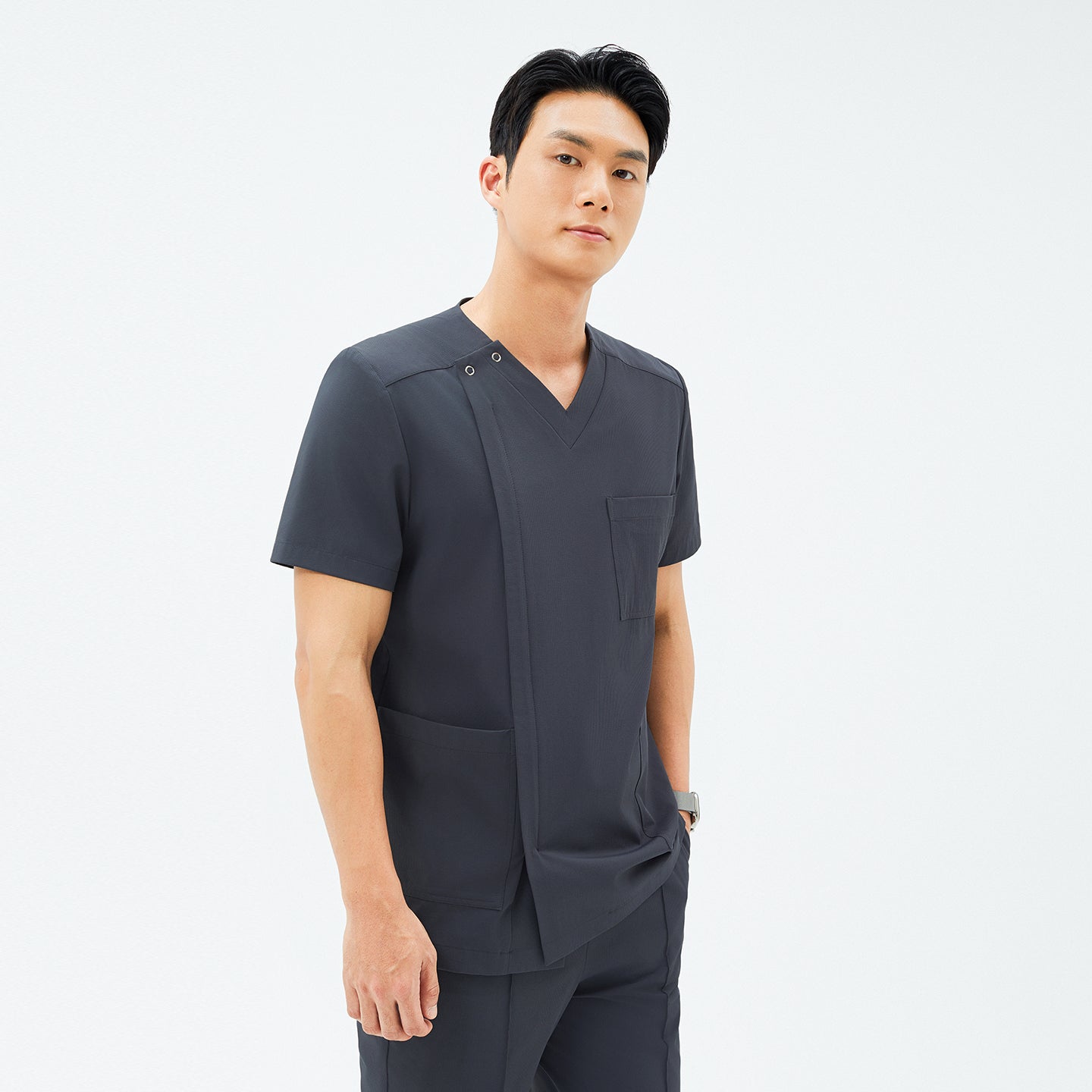 Front view of TUL DS-186 Men’s V-Snap Zipper Scrub Top in Deep Gray, showcasing a modern V-snap neckline and sleek zipper detail.