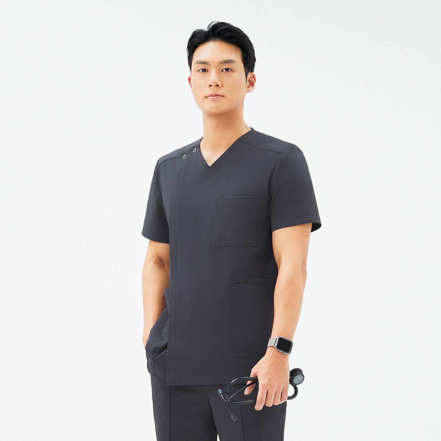 Front view of TUL DS-186 Men's V-Snap Zipper Scrub Top in Deep Gray, featuring a modern V-snap neckline, chest pocket, and short sleeves.