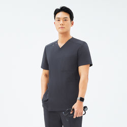 Image of Front view of TUL DS-186 Men's V-Snap Zipper Scrub Top in Deep Gray, featuring a modern V-snap neckline, chest pocket, and short sleeves.