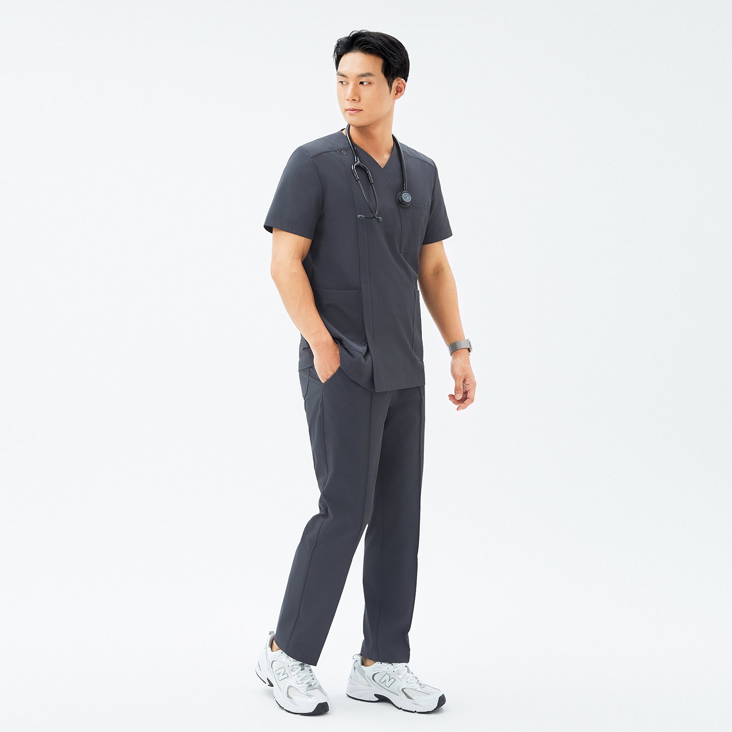 Full-length shot of TUL DS-186 Men's V-Snap Zipper Scrub Top in Deep Gray, paired with matching pants for a cohesive, professional uniform.
