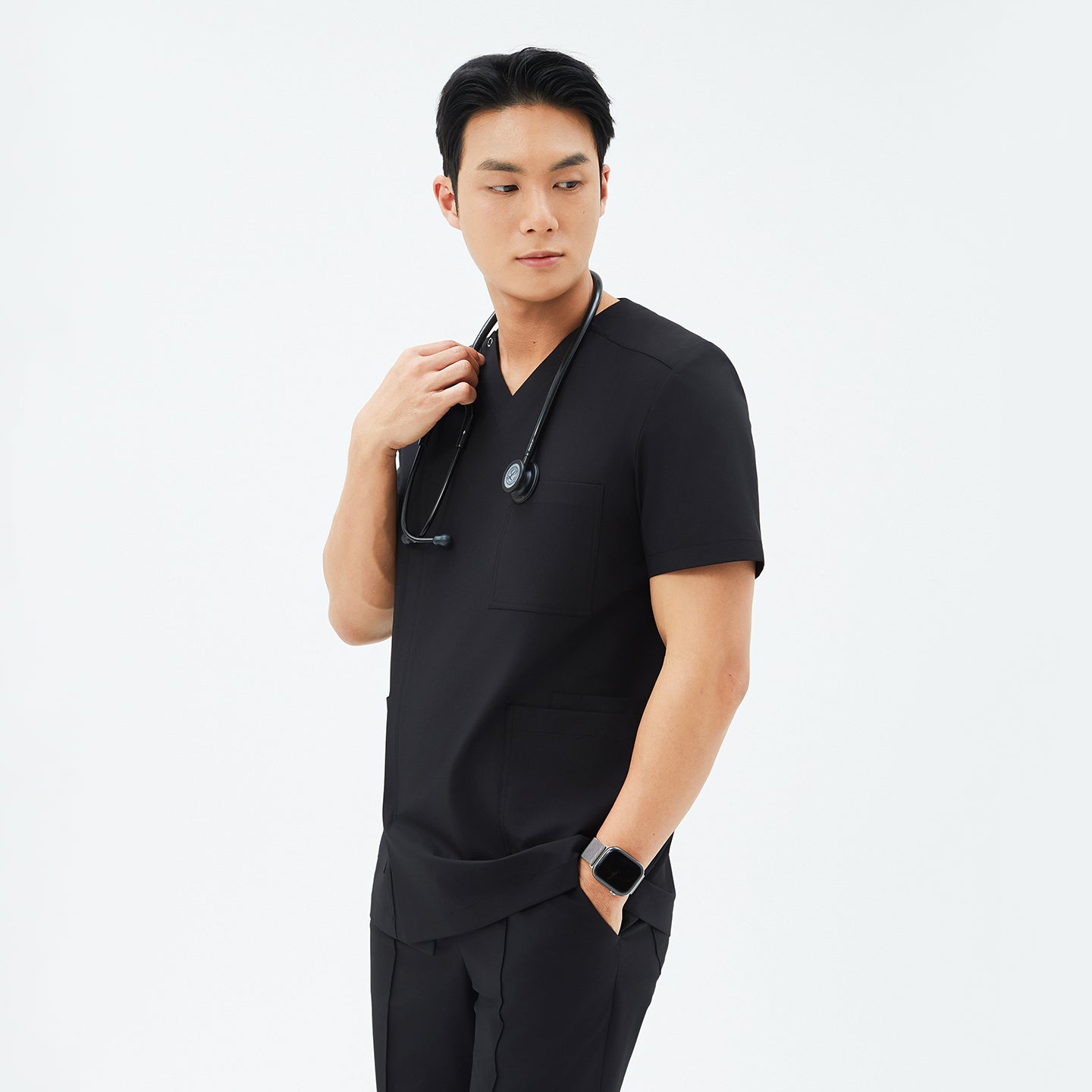 Side angle of TUL DS-184 Men's Eco Black scrub top, highlighting the tailored fit and clean, contemporary design.