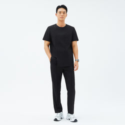 Image of Full-length view of TUL DS-187 Men's Round Snap Zipper Scrub Top in Eco Black, paired with matching pants for a cohesive, professional look.