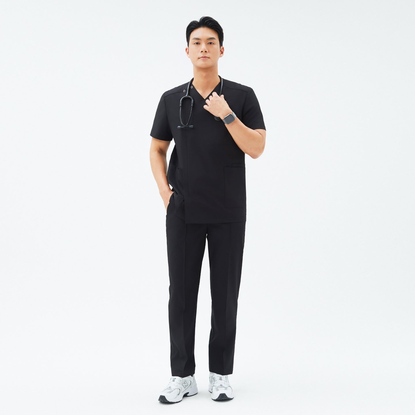 Image of Model wearing TUL Men’s Premium Banding Pants in Eco Black, showcasing a structured waistband and a comfortable, polished fit.