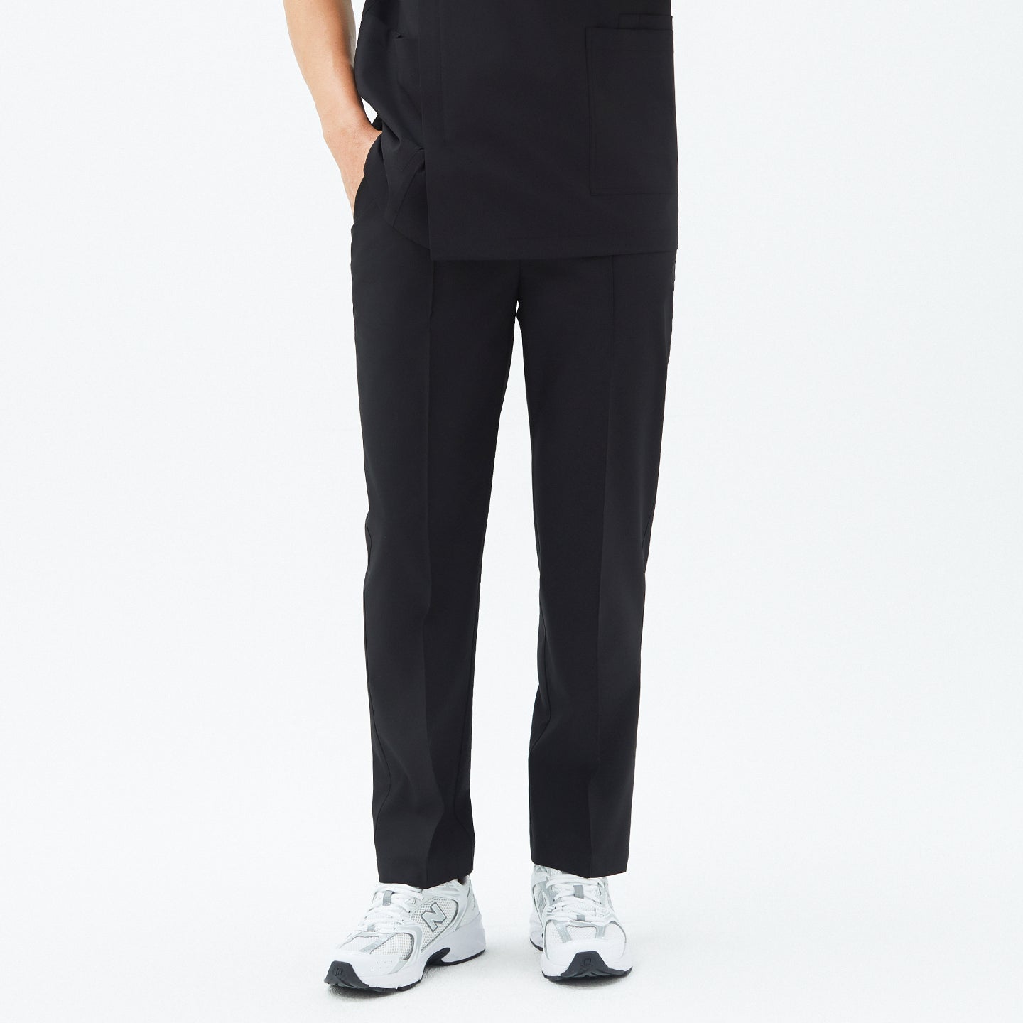 Image of Front view of TUL Men’s Premium Banding Pants in Eco Black, highlighting a clean, tailored silhouette and eco-friendly stretch fabric.